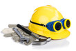 Photo: Helmet and tools isolated on white Helmet and tools isolated on white