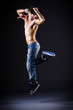 Dancer dancing in the dark studio