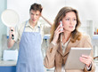 Business woman and her husband doing housework
