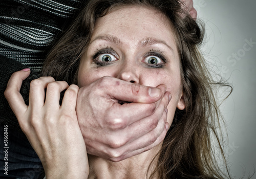 Photo: Portrait of scared woman with tears. Violence concept Portrait of scared woman with tears. Violence concept