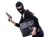 Criminal with gun isolated on white