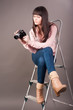 young woman with video camera