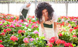 Woman checking flowers