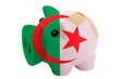 closed piggy rich bank with bandage in colors national flag of a