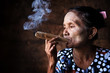 Old Asian woman smoking