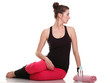 beautiful young brunette woman stretching muscles arms isolated