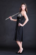 girl and flute on a black background