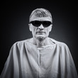 Photo: portrait of a man in black glasses portrait of a man in black glasses