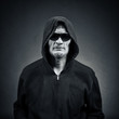 Photo: man in sunglasses and a hood man in sunglasses and a hood