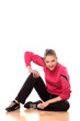 portrait of a beautiful teenage girl in tracksuits