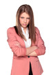 Angry and cute young girl posing with crossed arms