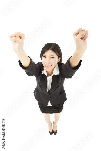 Photo: young happy business woman with success gesture young happy business woman with success gesture
