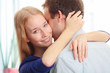 Photo: Portrait of a happy couple sitting together Portrait of a happy couple sitting together