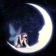 fairy with wings sitting on moon