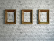 Three empty wooden frames