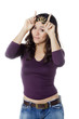 happy young woman playing funny evil