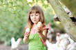 canvas print picture - portrait of a little girl with eggs