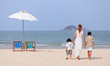 Mother and sons on beach