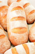 Photo: Composition with loafs of bread isolated on white background Composition with loafs of bread isolated on white background