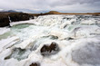 Frozen Waterfall In Iceland