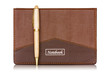 Brown notebook and pen