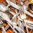 Silverware washed with water and detergent