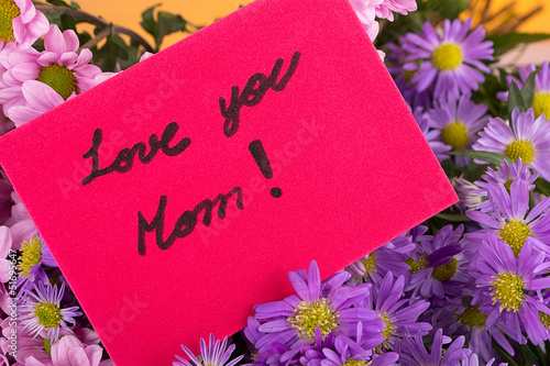 Photo: mother day greeting, love you mom, handwritten. mother day greeting, love you mom, handwritten.