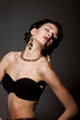 Beauty in Black Bra. Gold Jewelery.  Necklace and Earrings