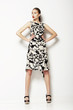 Simplicity. Woman in Ordinary Grey Summer Dress. Fashion
