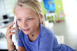 Teenaged girl talking on the phone