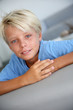 Photo: Portrait of young boy with blue eyes and shirt Portrait of young boy with blue eyes and shirt