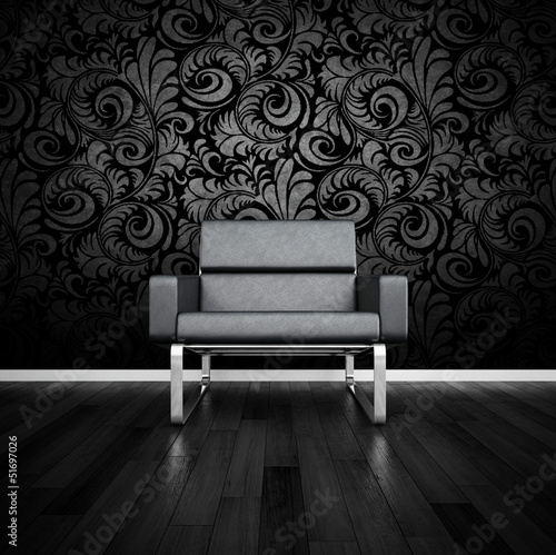 Illustration: Modern black design chair in front of dark wall Modern black design chair in front of dark wall