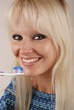 Woman brushing her teeth