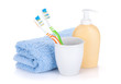 Photo: Two colorful toothbrushes, liquid soap and towel Two colorful toothbrushes, liquid soap and towel