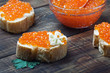 red caviar on slices of baguette