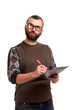 Photo: Young man with clipboard thinking Young man with clipboard thinking
