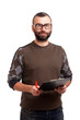 Photo: Young man writing on a clipboard Young man writing on a clipboard