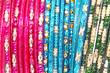 Traditional Indian bangles with different colors and patterns.