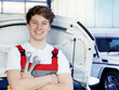 Car mechanic is satisfied with his job