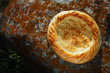 Traditional eastern lepeshka nan - white flat bread baked in old