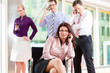 Foto: Business people - boss and employees in office Business people - boss and employees in office