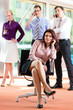 Foto: Business people - boss and employees in office Business people - boss and employees in office