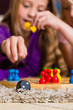 Foto: Family playing board game at home Family playing board game at home