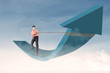 Businessman control arrow with chain on blue sky