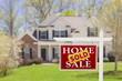 Photo: Sold Home For Sale Real Estate Sign and House Sold Home For Sale Real Estate Sign and House