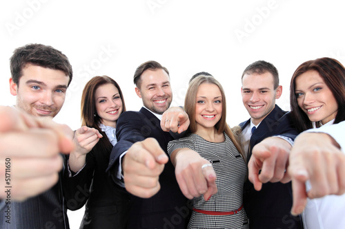 Photo: Happy diverse group of executives all pointing at you Happy diverse group of executives all pointing at you