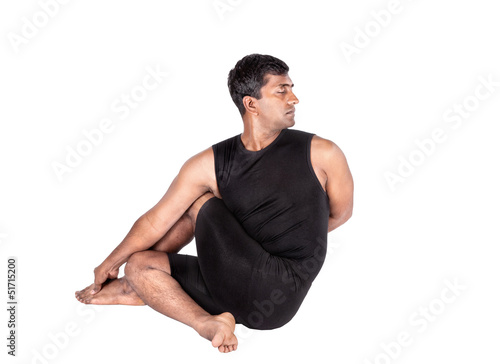 Photo: Yoga ardha matsyendrasana on white Yoga ardha matsyendrasana on white