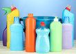 Cleaning items in bucket on  color background