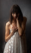 The brunette for a wet glass on a black background.