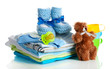 Photo: Pile of baby clothes isolated on white Pile of baby clothes isolated on white